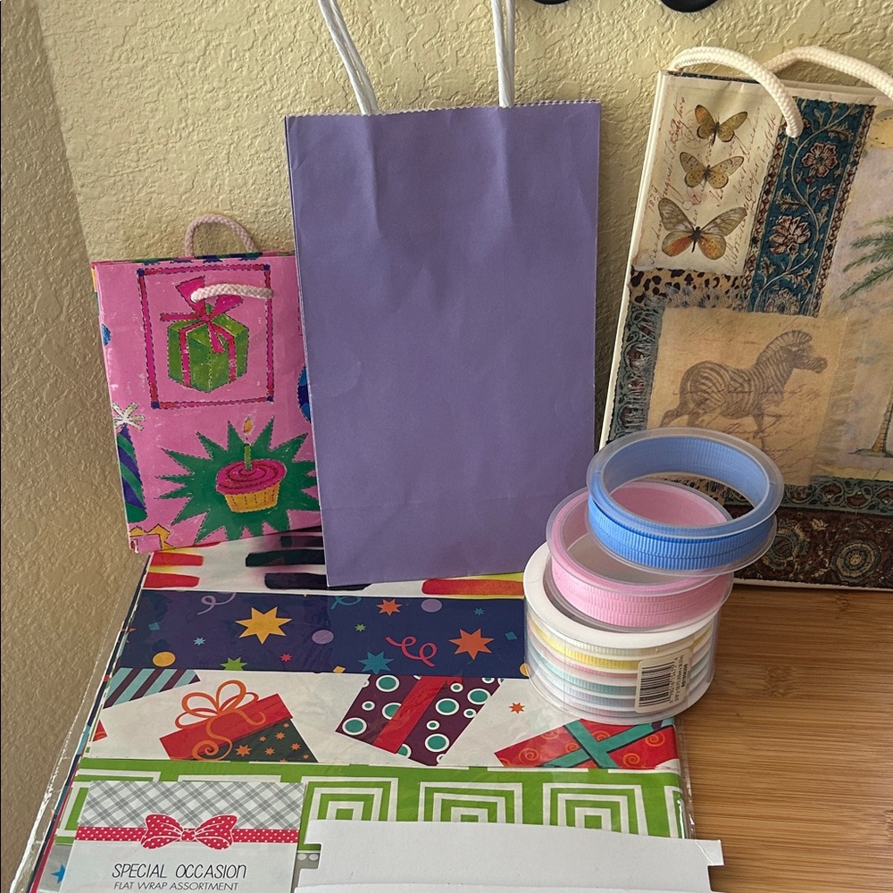 Gift Bags with Assorted Ribbons and flat wrap.